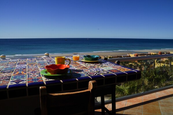 Dining al fresco on the beautiful tile high-top table