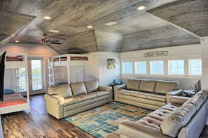 2nd lounge in Bunk room, leather, 65" TV, sleeps 8 built-in bunks, view to beach