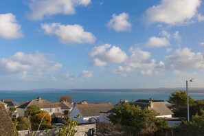 Top floor view over St Ives Bay to Godrevy Lighthouse and beyond