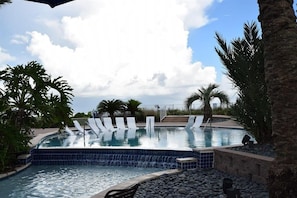 This beautiful pool looks over the bay and has a tropical feel to it.