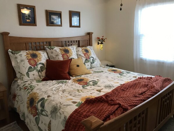 New King Memory Foam Mattress. Enjoy view of The Art Barn & Landscaped Backyard.