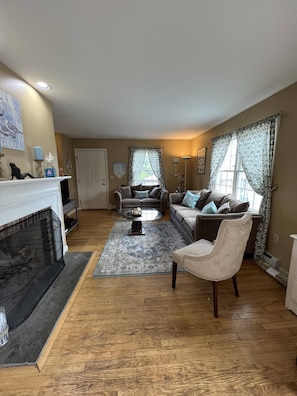 Living room with working fireplace.