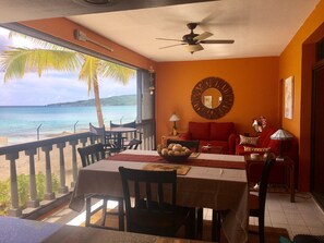Snuggle up on the comfy couch or love seat to enjoy your beach and sunset views!