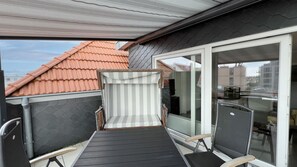 Balkon mit Markise