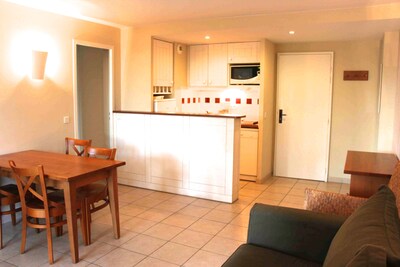 Large apartment in holiday village near the sea and golf courses