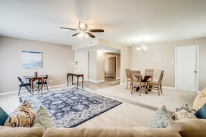 Great room with dining table.