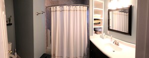 Full Bathroom off of Living Room Area