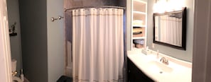 Full Bathroom off of Living Room Area