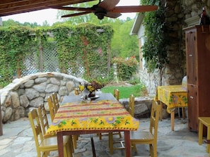 Covered outdoor dining. Ceiling fan and BBQ. Off the kitchen for elfresco dining