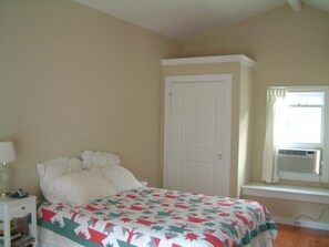 Large master bedroom with private bath, queen bed