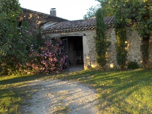 Car parking and entrance of the courtyard.