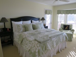 Master Bedroom, King bed, View of the lake, opens to the deck.