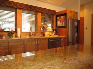 Beautiful new granite counter-tops and all new stainless appliances