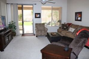 Family room with sliding door access to very private yard.