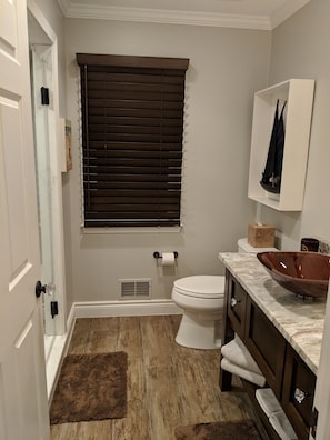 Wooden privacy blinds throughout suite