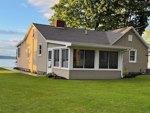 Rear exterior view. Screened-in back porch.