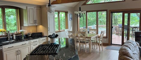 Great room with lots of windows and beautiful views of Stillpond.