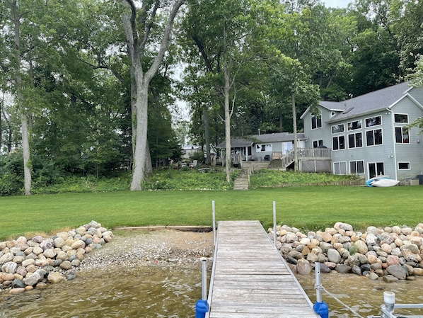 Water frontage 150ft with dock and walk-in to lake.