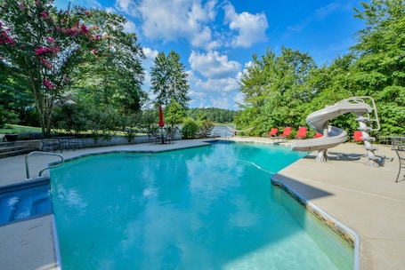 Poolside - The pool has the option to be heated during the chillier months. There is also a slide for extra fun!