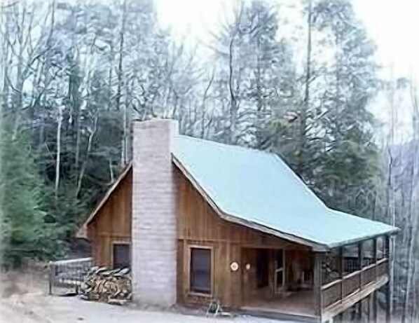 The front porch calls you to come visit Mountain Laurel Cabin