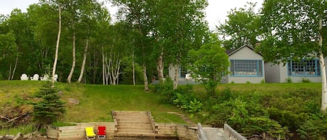 View of Boat Cottage, Kids' Beach, Steps, and  Walkway to Dock Area