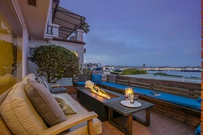 Relax with a glass of your preference on the front patio during sunset..