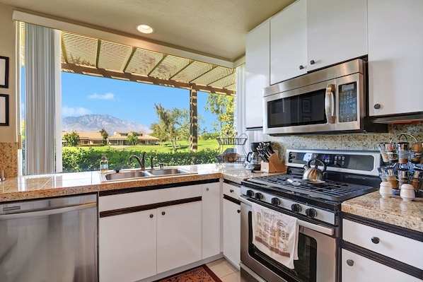 All the amenities and more in your Granite/Stainless  Gas Kitchen. What a view!