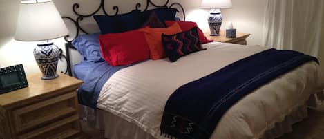 Master Bedroom with cozy down comforter, pillows and high thread count sheets