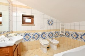 En suite bathroom with bathtub