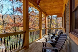 Spacious front porch with pretty mountain views