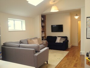 Living room/Reception. Open plan, opens up into the kitchen.