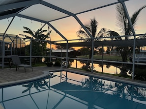 Pool and canal view at sunrise