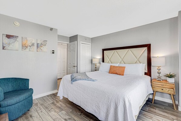 Witness a sunrise embrace from the comfort of the bed in our suite, where the morning light paints the room in warm hues, setting a serene and peaceful tone.