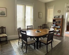 Dining room with 8 chairs + high chair.