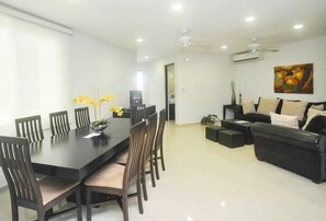 The condo is bright and modern, with sleek furnishings