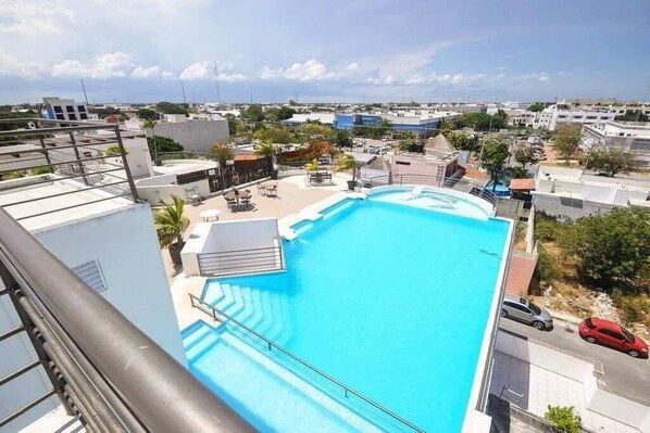 This is the best part of this home: the stunning rooftop deck and pool!