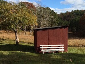 A shed used for horses until ten years ago that's   below the house