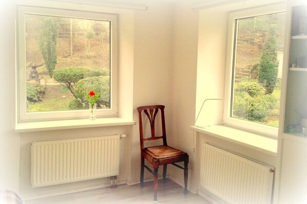 cozy, romantic and very clean room with a garden view !