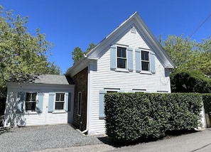 The house is located on a quiet West End St. Parking for up to 2 cars.