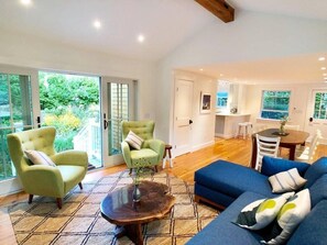 Living room with doors to garden 