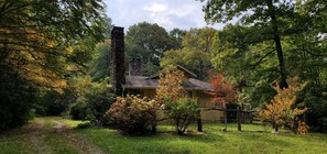 East side of house showing fenced in yard for dog(s)...