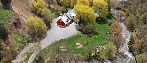 The Red Cub Lodge, surrounded by the Cub River.