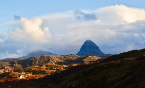 Highland Haven in the sun with Suilven in the background