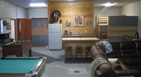 Kitchenette is stocked with microwave, electric griddle, coffeepot and fridge.