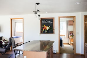 Entry view of our custom sandstone island and two bedrooms.