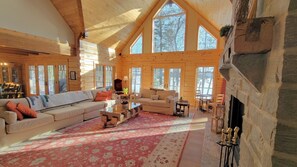 Great room . Million dollar lakefront view. Custom furniture.  Persian rugs.