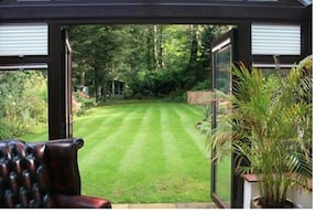 View of back garden from the garden room