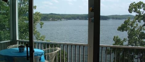 Large screened balcony on the lake. Also has a rocking chair and porch swing.