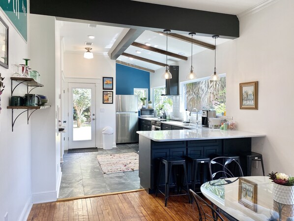 Enjoy meals at home in the beautiful modern kitchen with counter seating 