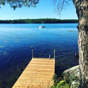 dock and raft at the farm's private beach area on Toddy Pond